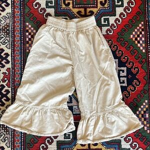 Cream Ruffle Bottoms